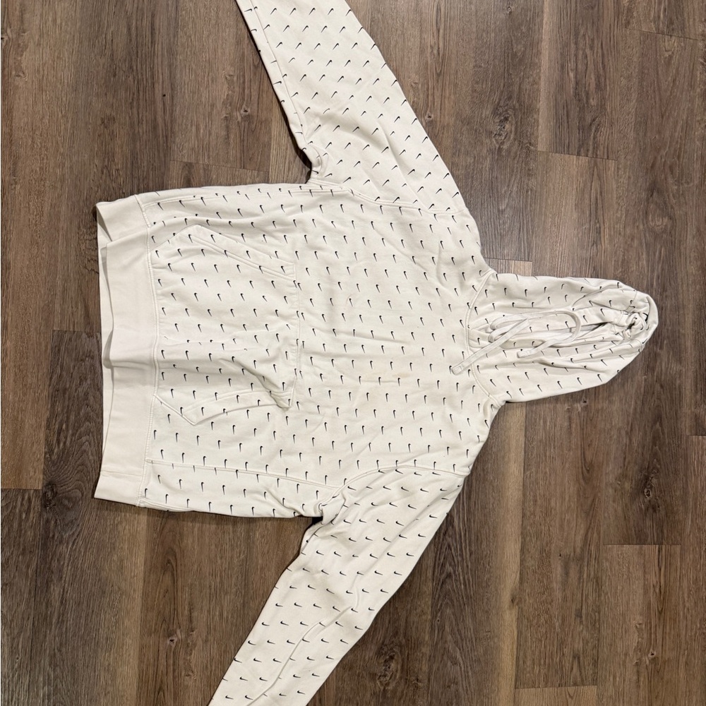 Nike White Hoodie with Black Swoosh Pattern